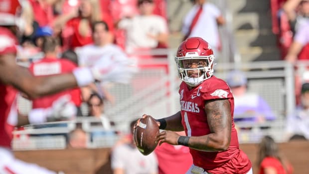 Razorbacks quarterback KJ Jefferson rolls out against Mississippi State on Saturday